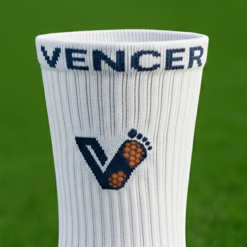 Vencer Grip-socks cuff and branding detail
